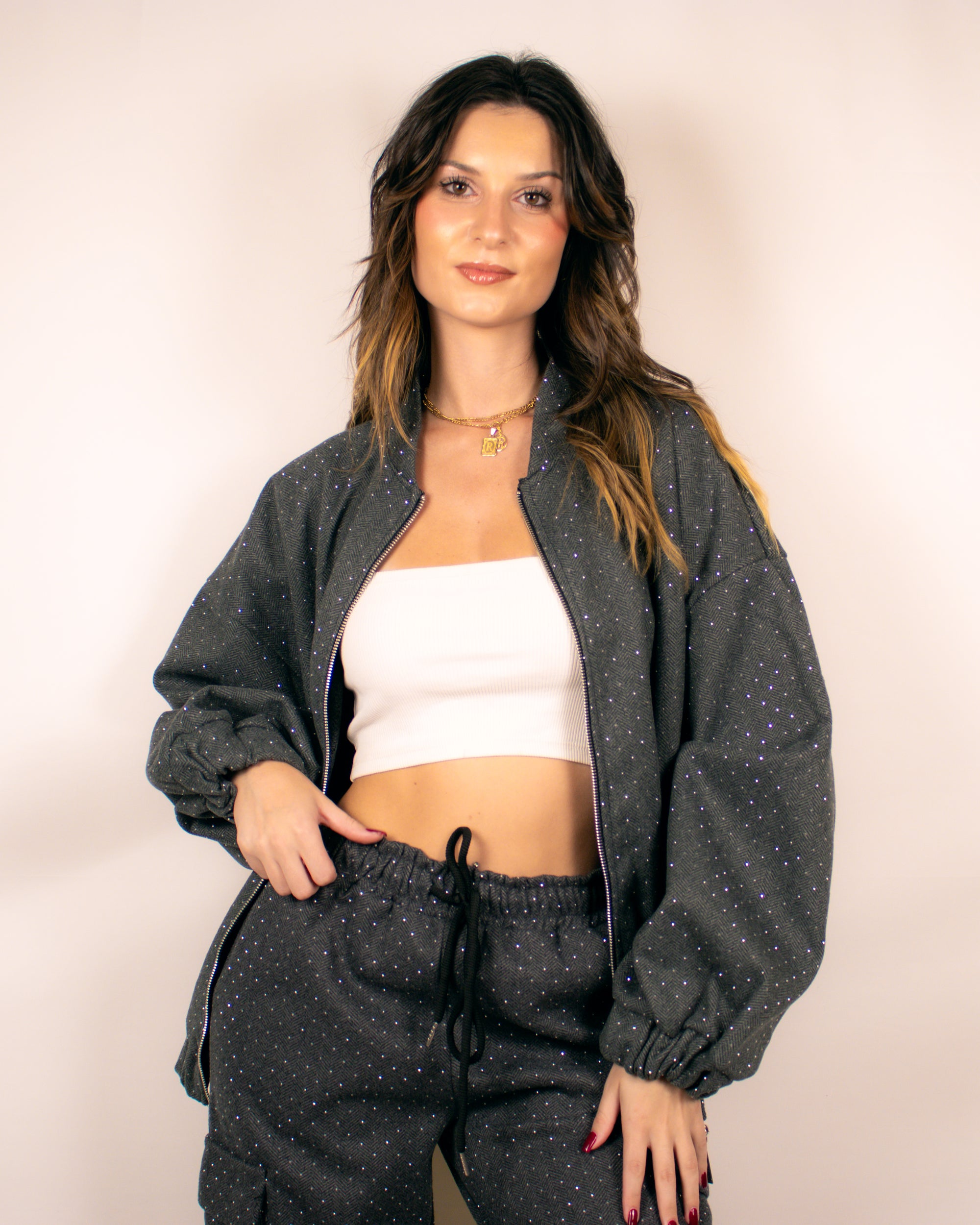 Fato de treino com detalhes em brilho