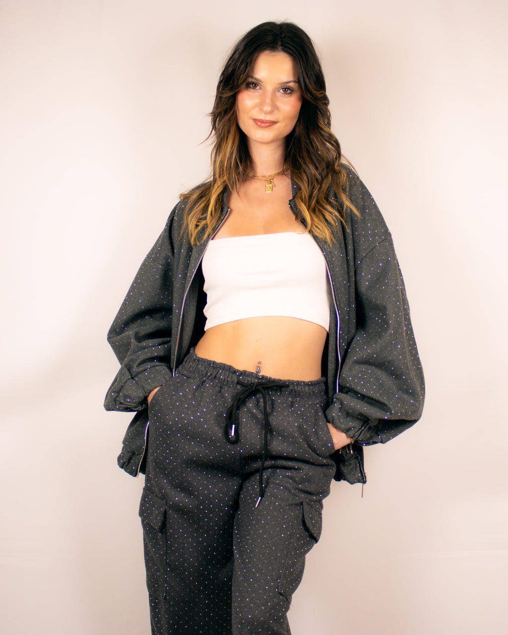 Fato de treino com detalhes em brilho