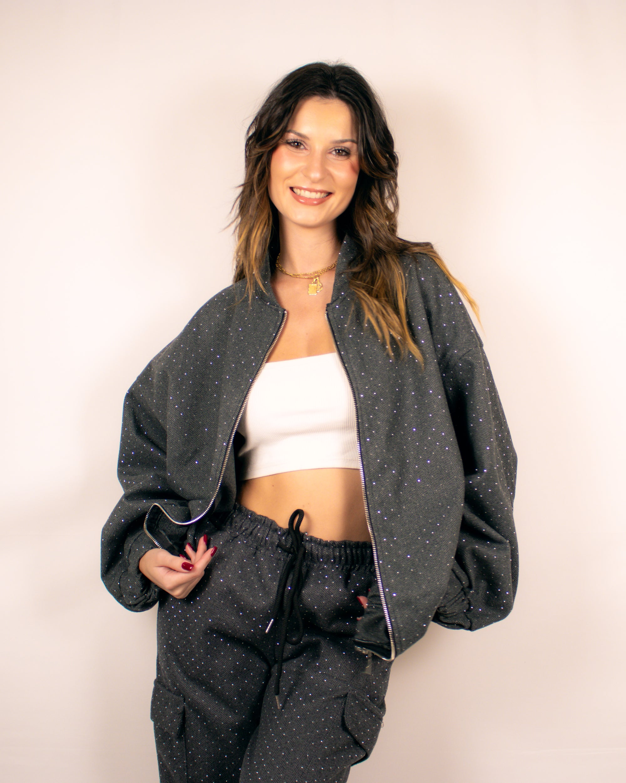 Fato de treino com detalhes em brilho